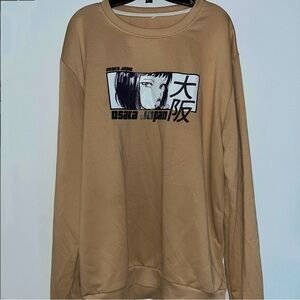 Brown long-sleeved sweater with an anime design